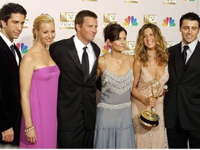 In this file photo taken on September 21, 2002, cast members from "Friends," which won Outstanding Comedy, series pose at the 54th Annual Emmy Awards in the Shrine Auditorium in Los Angeles.  From L to R are David Schwimmer, Lisa Kudrow, Mathew Perry, Courtney Cox Arquette, Jennifer Aniston and Matt LeBlanc.