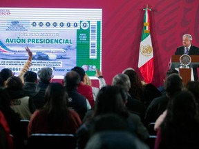 Handoout released by Mexican Presidency press office showing Mexican President Andres Manuel Lopez during a press conference at the Palacio Nacional in Mexico City on January 28, 2020, to announce the launching of lottery tickets to sell the presidential plane.