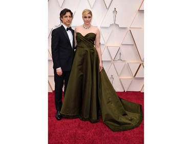 Noah Baumbach, left, and Greta Gerwig  pose on the red carpet at the 92nd Annual Academy Awards on Feb. 9, 2020 in Hollywood, Calif.