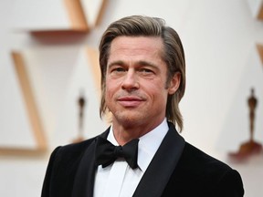 Brad Pitt poses on the red carpet at the 92nd Annual Academy Awards in Hollywood, Calif., Feb. 9, 2020.