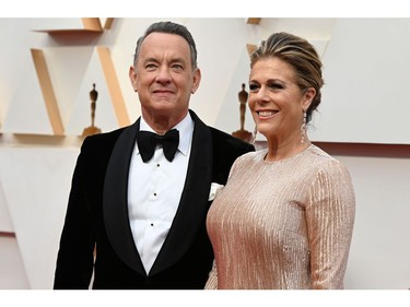 Tom Hanks and wife Rita Wilson pose on the red carpet at the 92nd Annual Academy Awards on Feb. 9, 2020 in Hollywood, Calif.