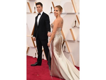 Scarlett Johansson and Colin Jost arrive at the red carpet at the 92nd Annual Academy Awards on Feb. 9, 2020 in Hollywood, Calif.