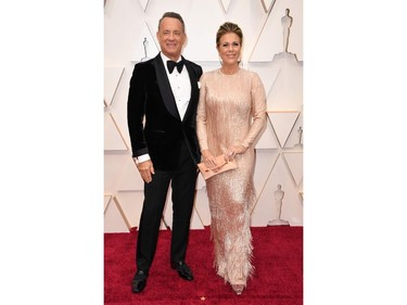 Tom Hanks and his wife Rita WIlson pose on the red carpet at the 92nd Annual Academy Awards on Feb. 9, 2020 in Hollywood, Calif.