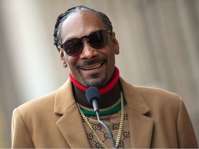 In this file photo taken on November 19, 2018 Rapper Snoop Dogg attends the ceremony honoring him with a Star on Hollywood Walk of Fame, in Hollywood, California.