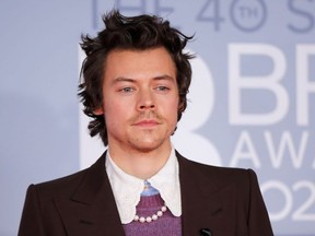 British singer-songwriter Harry Styles poses on the red carpet on arrival for the BRIT Awards 2020 in London on February 18, 2020.