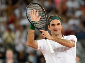 In this file photo taken on Feb. 7, 2020 Switzerland's Roger Federer reacts after his victory against Spain's Rafael Nadal during their tennis match at The Match in Africa at the Cape Town Stadium, in Cape Town. (RODGER BOSCH/AFP via Getty Images))