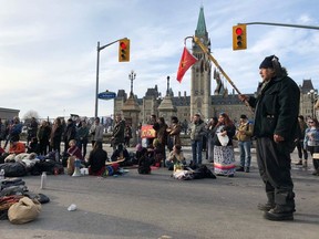 Protesters gather in the streets of Ottawa, Canada on February 24, 2020 in support of a small group fighting construction of a natural gas pipeline on indigenous lands in British Columbia.