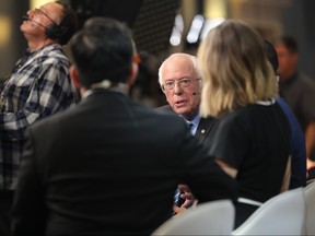Democratic presidential hopeful Vermont Senator Bernie Sanders gives an interview in the spin room after participating in the tenth Democratic primary debate of the 2020 presidential campaign season co-hosted by CBS News and the Congressional Black Caucus Institute at the Gaillard Center in Charleston, S.C., on Feb. 25, 2020. (LOGAN CYRUS/AFP via Getty Images)