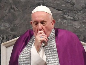 Pope Francis attends the Ash Wednesday mass which opens Lent, the forty-day period of abstinence and deprivation for Christians before Holy Week and Easter, on Feb. 26, 2020, at the Santa Sabina church in Rome.