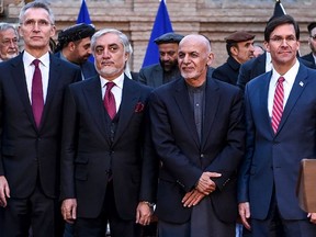 NATO Secretary General Jens Stoltenberg (L) pose along with Afghan presidential election opposition candidate Abdullah Abdullah (2L), Afghanistan's President Ashraf Ghani (2R) and US Secretary of Defense Mark Esper (R) after a press conference at the presidential palace in Kabul on February 29, 2020.