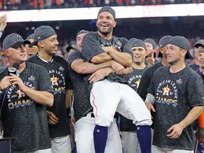 Jose Altuve of the Houston Astros is awarded series MVP following the American League Championship Series at Minute Maid Park on October 19, 2019 in Houston. (Elsa/Getty Images)