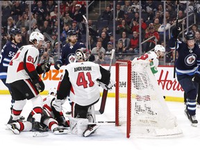 Senators goaltender Craig Anderson was pullled after giving up four goals on 22 shots in a 5-2 loss to the Winnipeg Jets on Saturday. (James Carey Lauder/USA TODAY Sports)