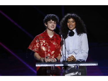 Presenters Noah Jute and Taylor Russell present the best first screenplay award at the Independent Spirit Awards.