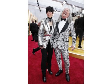 Diane Warren and a guest pose on the red carpet at the 92nd Annual Academy Awards at Hollywood and Highland on Feb. 9, 2020 in Hollywood, Calif.