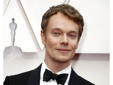 Alfie Allen poses on the red carpet at the 92nd Annual Academy Awards on Feb. 9, 2020 in Hollywood, Calif.