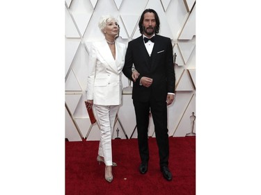 Keanu Reeves and his mother Patricia Taylor poses on the red carpet at the 92nd Annual Academy Awards on Feb. 9, 2020 in Hollywood, Calif.