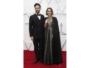 Natalie Portman and Benjamin Millepied pose on the red carpet at the 92nd Annual Academy Awards on Feb. 9, 2020 in Hollywood, Calif.