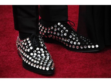 A detail of Anthony Ramos's shoes is shown as he poses on the red carpet during the Oscars arrivals at the 92nd Academy Awards in Hollywood, Los Angeles, Calif., Feb. 9, 2020.