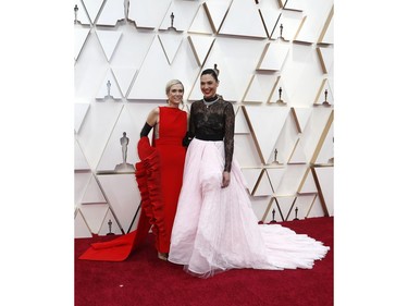 Kristen Wiig and Gal Gadot pose on the red carpet at the 92nd Annual Academy Awards on Feb. 9, 2020 in Hollywood, Calif.
