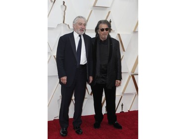 Robert de Niro and Al Pacino pose on the red carpet at the 92nd Annual Academy Awards on Feb. 9, 2020 in Hollywood, Calif.