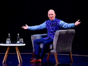 In this Jan. 14, 2020, file photo, Amazon CEO Jeff Bezos gestures during the Amazon's annual Smbhav event in New Delhi.