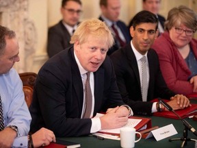 Britain's Prime Minister Boris Johnson chairs his first meeting of the cabinet the day after a reshuffle at 10 Downing Street in London on Feb. 14, 2020.