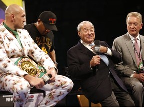 Tyson Fury, trainer Javan Steward and promoters Bob Arum and Frank Warren during a press conference after the fight.