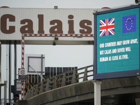 A digital information screen at the Calais Ferry terminal declares that "Our Countries May Grow Apart, But Calais and Dover Will Remain As Close As Ever" in Calais, France, on Sunday, Feb. 2, 2020.