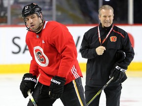 Calgary Flames forward Milan Lucic, left and head coach Geoff Ward were photographed during team practice in Calgary on Monday, Feb. 3, 2020.