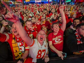 Fans cheer on the Chiefs at the Power and Light District as the Kansas City Chiefs play the San Francisco 49ers in the Super Bowl on Sunday, Feb. 2, 2020 in Kansas City, Kansas.