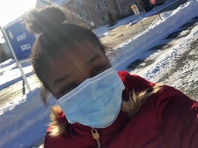 Myriam Larouche takes a selfie while out for some fresh air at Yukon Lodge, at Canadian Forces Base Trenton, Ont. on Monday, Feb. 10, 2020, in this handout photo.