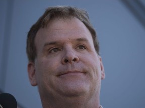 Former Conservative MP John Baird speaks to the media in Markham, Ont., on Sunday, Oct. 11, 2015.