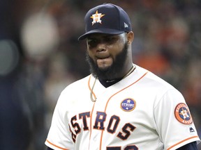 In this Sept. 16, 2017 file photo Houston Astros relief pitcher Francis Martes walks toward the dugout after being pulled against the Seattle Mariners in Houston. (AP Photo/David J. Phillip, file)