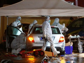 Police forensic officers work at the scene after a car ploughed into a carnival parade injuring several people in Volkmarsen, Germany February 24, 2020. (REUTERS/Thilo Schmuelgen)