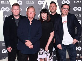 Left to right: Phil Cunningham, Bernard Sumner, Gillian Gilbert, Tom Chapman and Stephen Morris of the band New Order attend the GQ Men Of The Year Awards 2019 at Tate Modern on Sept. 3, 2019 in London. (Jeff Spicer/Getty Images)