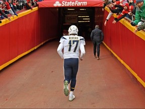 Quarterback Philip Rivers of the Los Angeles Chargers runs up the tunnel after the Chargers loss 31-21 to the Kansas City Chiefs at Arrowhead Stadium on December 29, 2019 in Kansas City, Missouri.