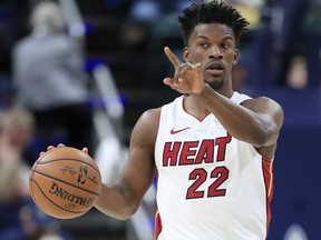 Jimmy Butler of the Miami Heat dribbles the ball against the Indiana Pacers at Bankers Life Fieldhouse on Jan. 8, 2020 in Indianapolis, Ind.   (Andy Lyons/Getty Images)
