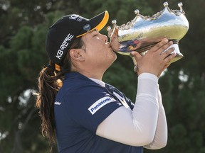 Park In-bee of Korea kisses her winner's trophy during day four of the 2020 ISPS HANDA Women's Australian Open at Royal Adelaide Golf Club on Feb. 16, 2020 in Adelaide, Australia. (Sue McKay/Getty Images)