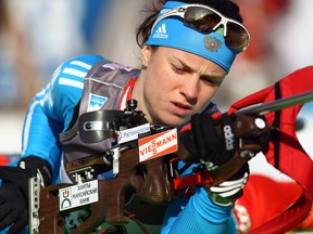 Svetlana Sleptsova of Russia prepares to shoot during the warm up in the women's 7.5 km sprint during the IBU Biathlon World Championships at Chiemgau Arena on March 3, 2012 in Ruhpolding, Germany.  (Martin Rose/Bongarts/Getty Images)