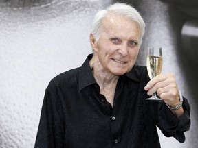 Robert Conrad poses on June 12, 2013 during a photocall for the TV show "The Wild Wild West" at the 53rd Monte-Carlo Television Festival in Monaco. (VALERY HACHE/AFP via Getty Images)