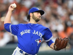 Mike Bolsinger of the Toronto Blue Jays pitches in the first inning during a baseball game against the Baltimore Orioles at Oriole Park at Camden Yards on May 20, 2017 in Baltimore, Maryland.