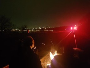 A group called Wet'suwet'en Strong: Hamilton in Solidarity posted this photo of demonstrators blocking the railroad near Hamilton, Ont., Monday night. (Wet'suwet'en Strong: Hamilton in Solidarity Facebook)