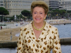 (FILES) In this file photo US author Mary Higgins Clark poses during the 17th MIPCOM (Marché international des films et des programmes pour la télévision, la vidéo, le câble et le satellite) in Cannes, France on October 9, 2001. - Best-selling American author "Queen of Suspense" Mary Higgins Clark, known by her fans as the "Queen of Suspense", has died aged 92, her publisher confirmed Friday. (Photo by Pascal GUYOT / AFP) (Photo by PASCAL GUYOT/AFP via Getty Images)