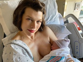 Milla Jovovich is seen with her newborn daughter, Osian, in this Instagram photo.