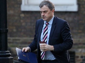In this file photo taken on February 6, 2020 Northern Ireland Secretary Julian Smith arrives at 10 Downing Street in central London on February 6, 2020, to attend a meeting of the cabinet. (ISABEL INFANTES/AFP via Getty Images)