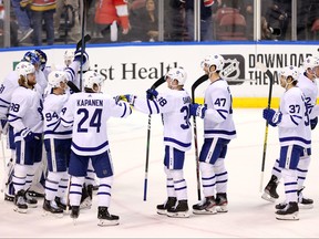 Leafs players celebrate their win over Florida in Sunrise, Fla., on Thursday. Toronto hosts Vancouver on Saturday. (USA TODAY SPORTS)