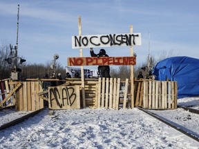 Supporters of the Wet'suwet'en who are against the LNG pipeline, block a CN Rail line just west of Edmonton on Wednesday February 19, 2020.