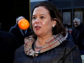 Sinn Fein leader Mary Lou McDonald juggles with mandarins as she meets with members of the public in Dublin, Ireland, February 10, 2020. (REUTERS/Phil Noble/File Photo)