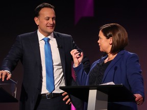 Fine Gael leader, Taoiseach Leo Varadkar (left) and Sinn Fein leader Mary Lou McDonald interact during the leaders’ debate at the National University of Ireland Galway (NUIG) campus in Galway, Ireland on January 27, 2020. (NIALL CARSON/POOL/AFP via Getty Images)