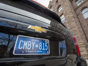 One of Ontario Premier Doug Ford's vehicles sits parked at the Ontario Legislature sporting a new licence plate in Toronto on Thursday Feb. 20, 2020.